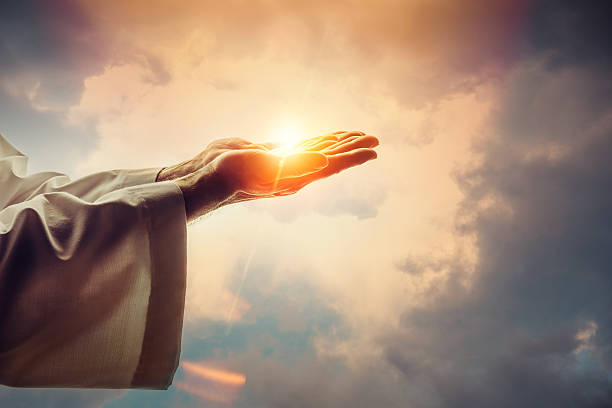 Male hands holding sunlight